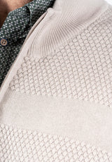 Nilson strik med struktur og zip i lys sand