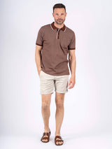 Hester polo med brystlomme I brun