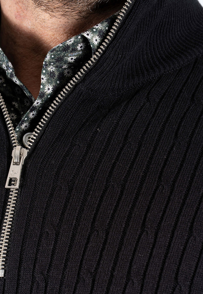 Tristan strik med struktur og zip i sort